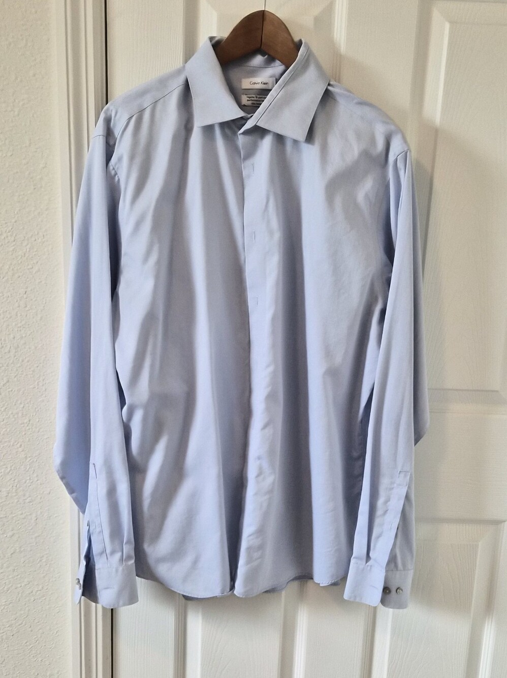 Calvin Klein Pale Blue Men's Dress Shirt with Hidden Placket